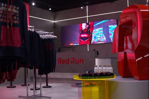 Interior of Red Run store, Liverpool One, showing a screen and products on display